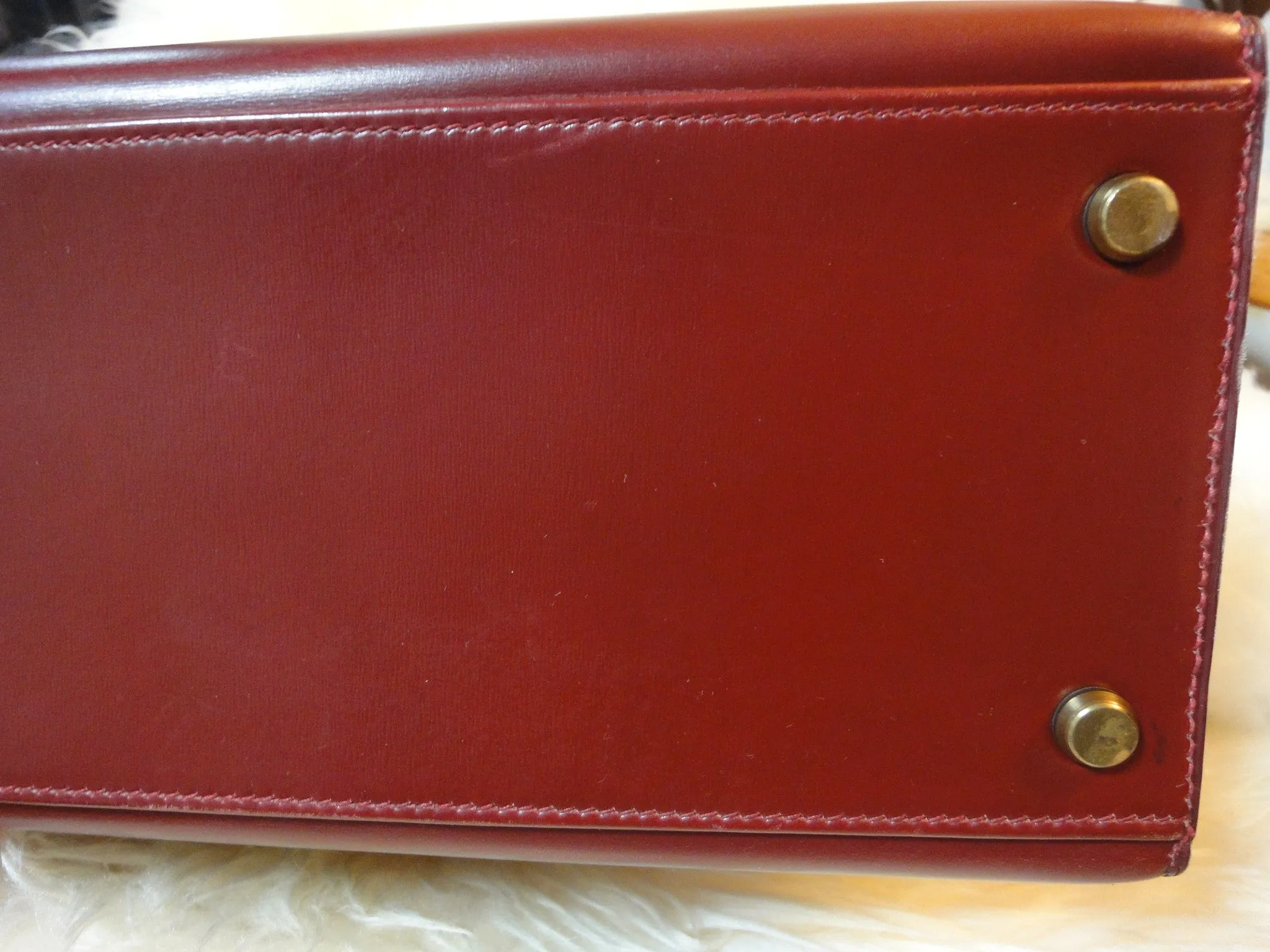 1980s Vintage HERMES Kelly 32 bag rouge ash box calf leather with gold hardware. Exterior stitch. Stamp K in O, 1981. Best known classic bag