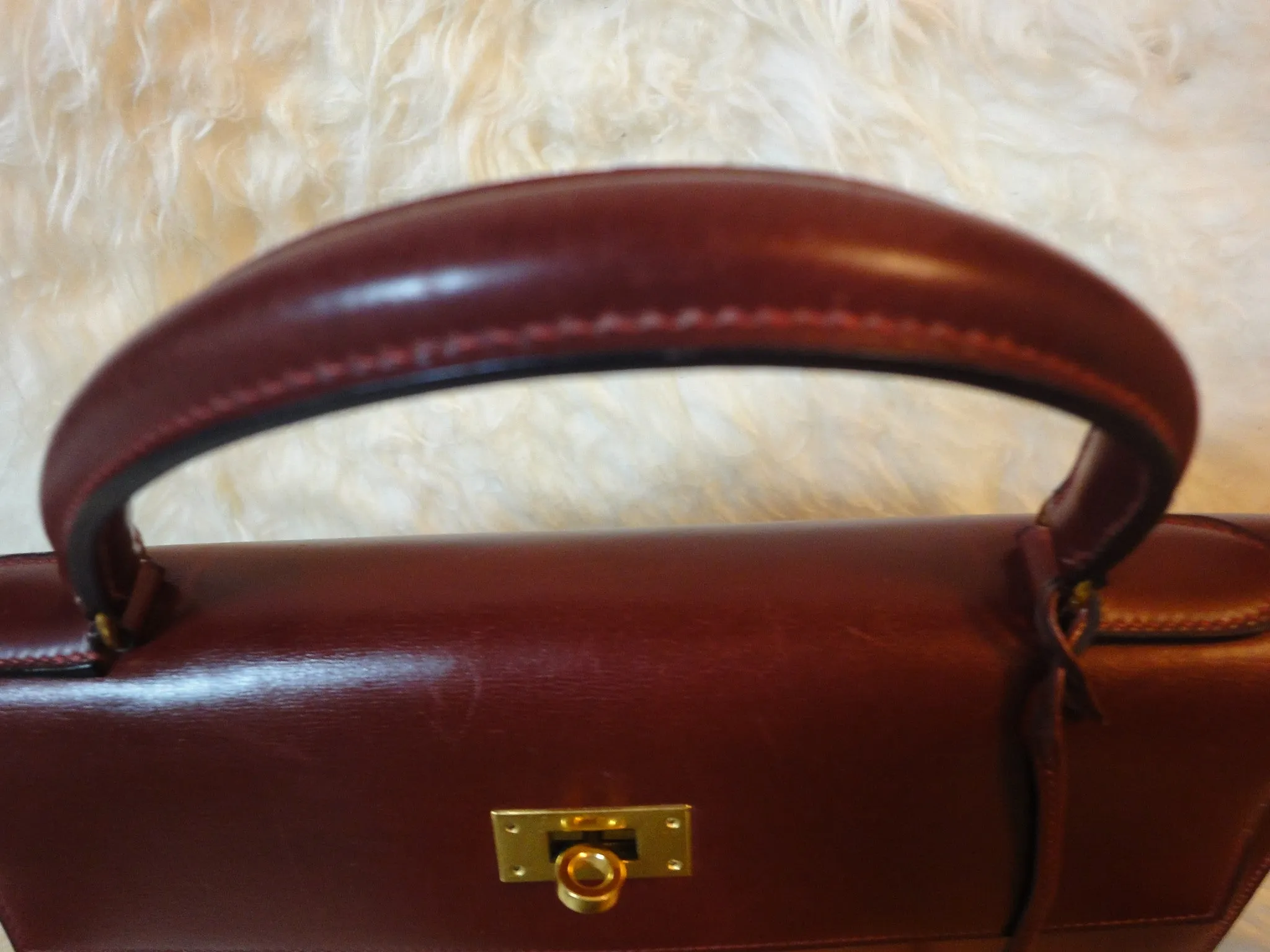 1980s Vintage HERMES Kelly 32 bag rouge ash box calf leather with gold hardware. Exterior stitch. Stamp K in O, 1981. Best known classic bag