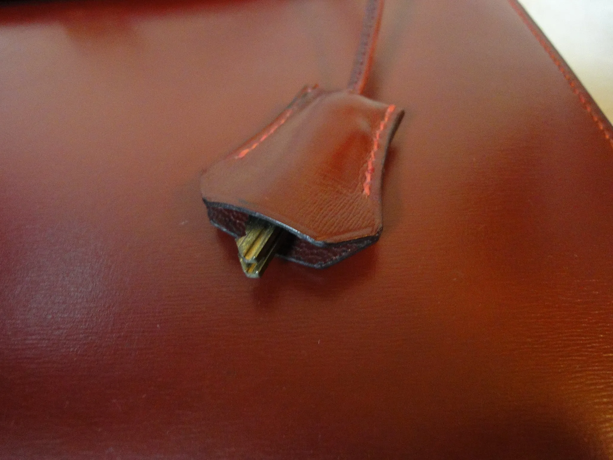1980s Vintage HERMES Kelly 32 bag rouge ash box calf leather with gold hardware. Exterior stitch. Stamp K in O, 1981. Best known classic bag