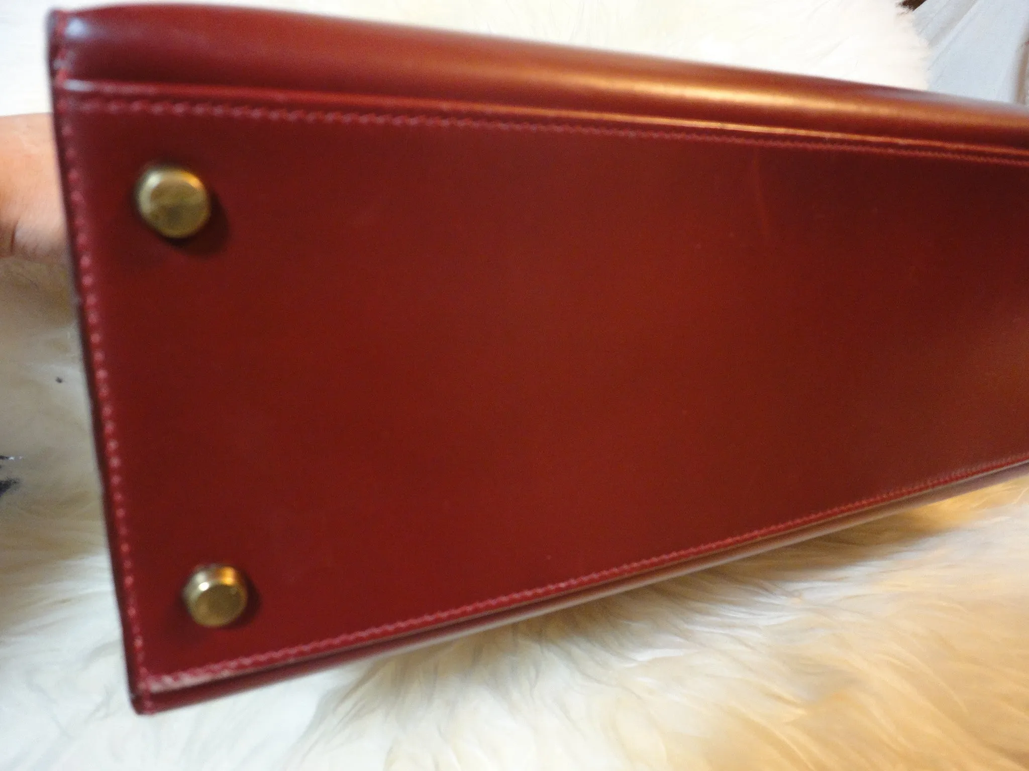 1980s Vintage HERMES Kelly 32 bag rouge ash box calf leather with gold hardware. Exterior stitch. Stamp K in O, 1981. Best known classic bag
