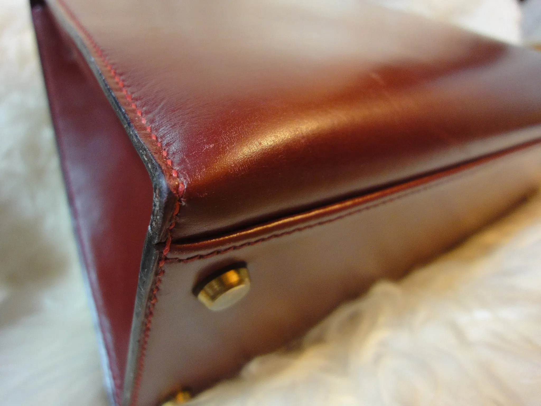 1980s Vintage HERMES Kelly 32 bag rouge ash box calf leather with gold hardware. Exterior stitch. Stamp K in O, 1981. Best known classic bag