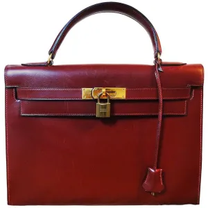 1980s Vintage HERMES Kelly 32 bag rouge ash box calf leather with gold hardware. Exterior stitch. Stamp K in O, 1981. Best known classic bag