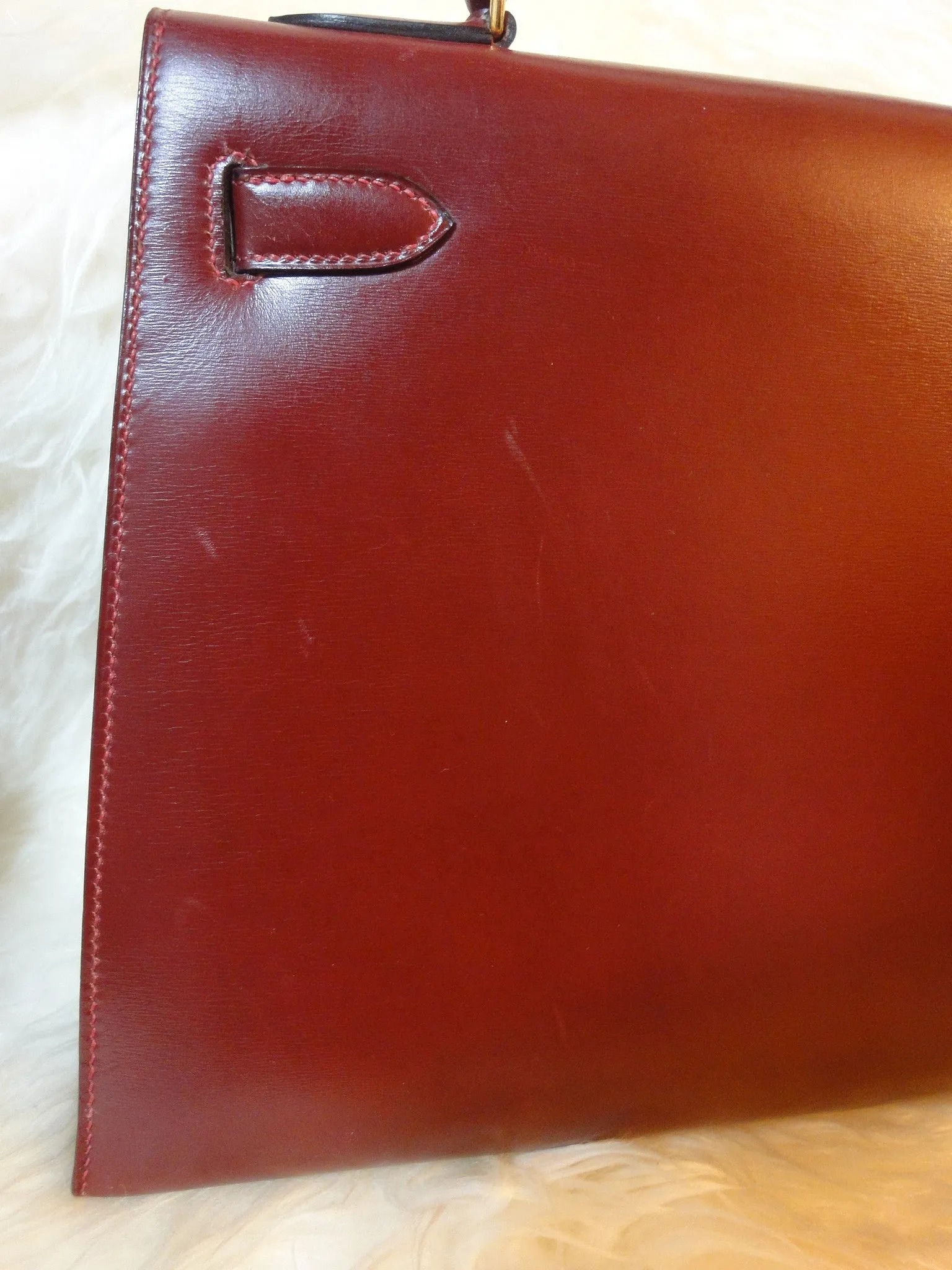 1980s Vintage HERMES Kelly 32 bag rouge ash box calf leather with gold hardware. Exterior stitch. Stamp K in O, 1981. Best known classic bag