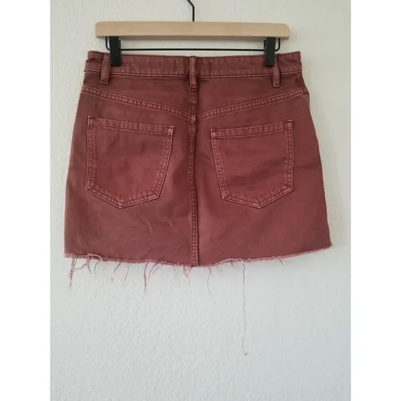 FREE People – We the Free Rust denim front zip it up mini skirt w/ raw edge hem
