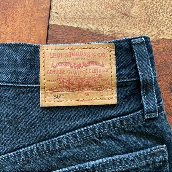 Levi’s 501 Black Denim Raw Hem Shorts - 24