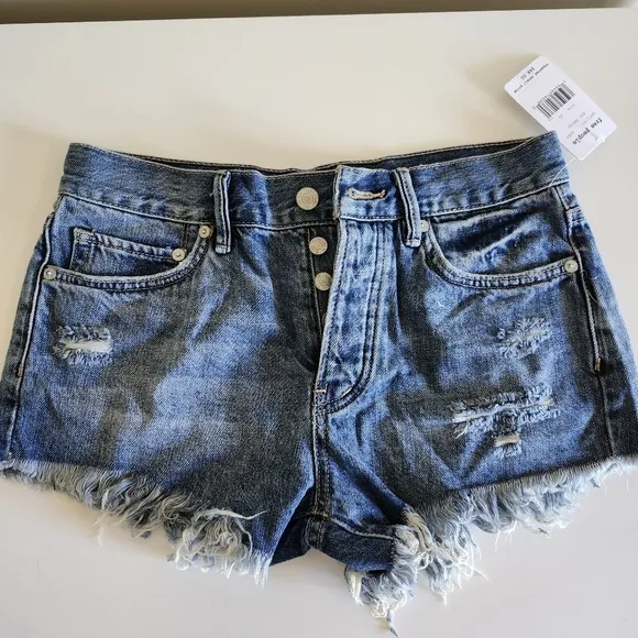 NWT Free People Loving Good Vibrations Denim Cutoff Shorts in Mid Indigo size 25