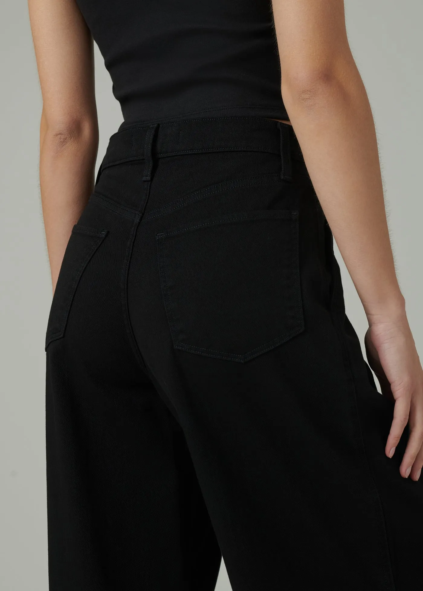 THE PLEATED DENIM TROUSER